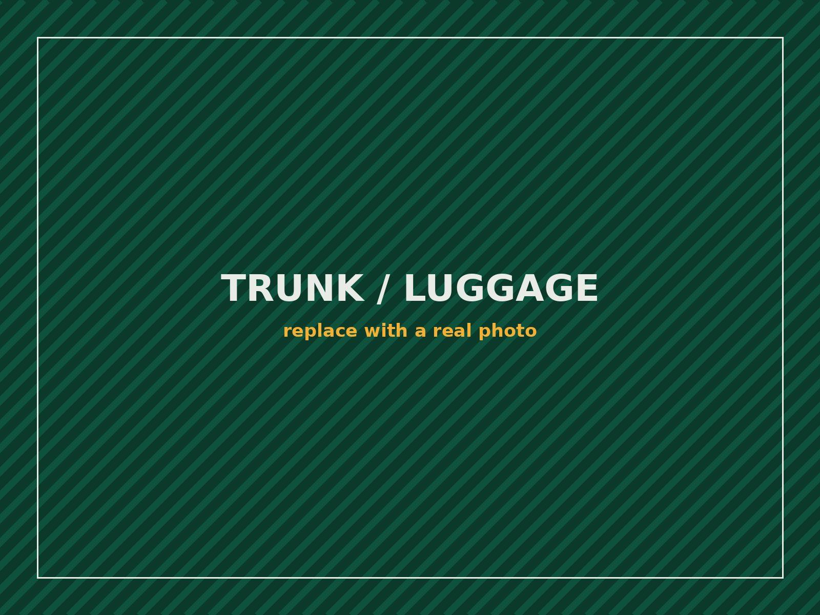 Three large suitcases loaded in the trunk of the 2026 Toyota Camry before a Monroe NY to JFK airport transfer